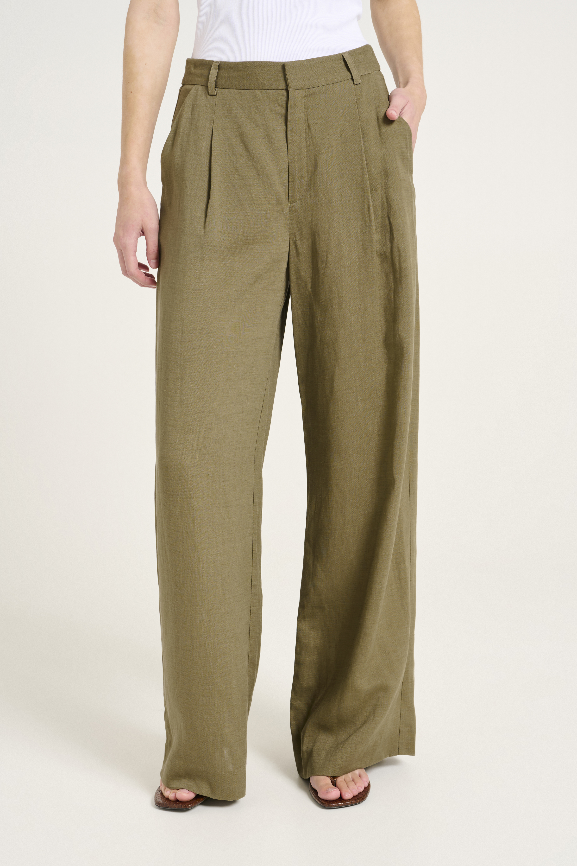 GOBELIN-STYLE JACQUARD 2-TUCK TAPERED PANTS WITH FRINGE HEM